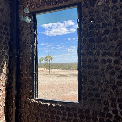 View through window of Bottle House